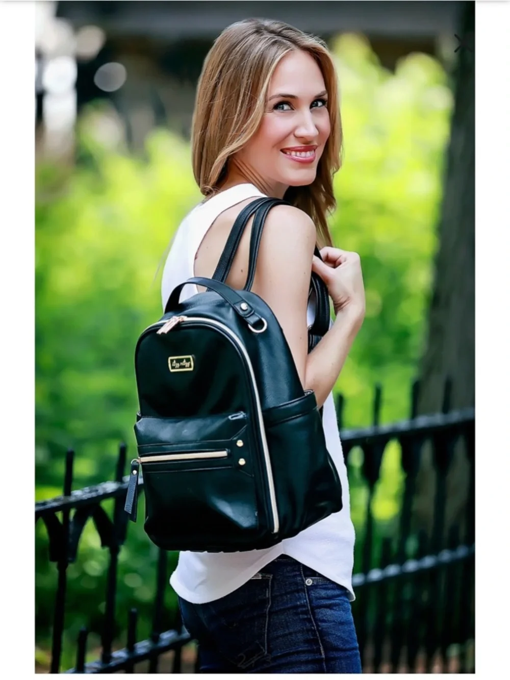 black faux leather diaper backpack Vegan Everyday carry that works for parent life—and every version of life after. Black